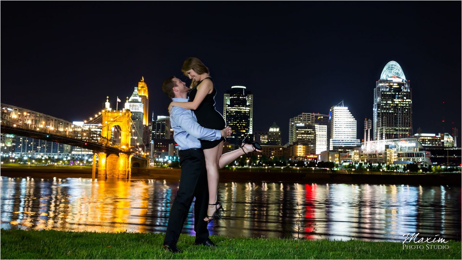 Ohio River Cincinnati skyline night engagement