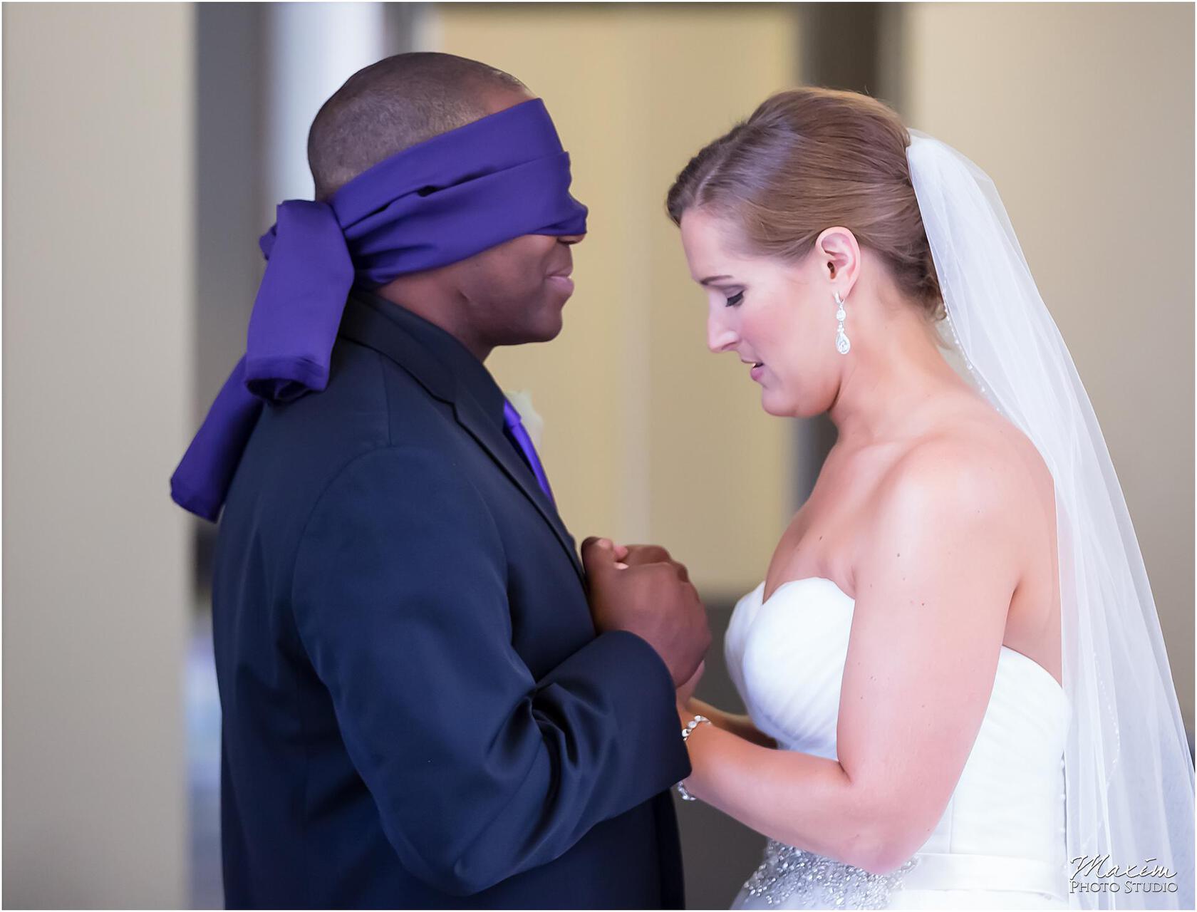 St. Aloysius Chapel Cincinnati Wedding bride groom blindfold