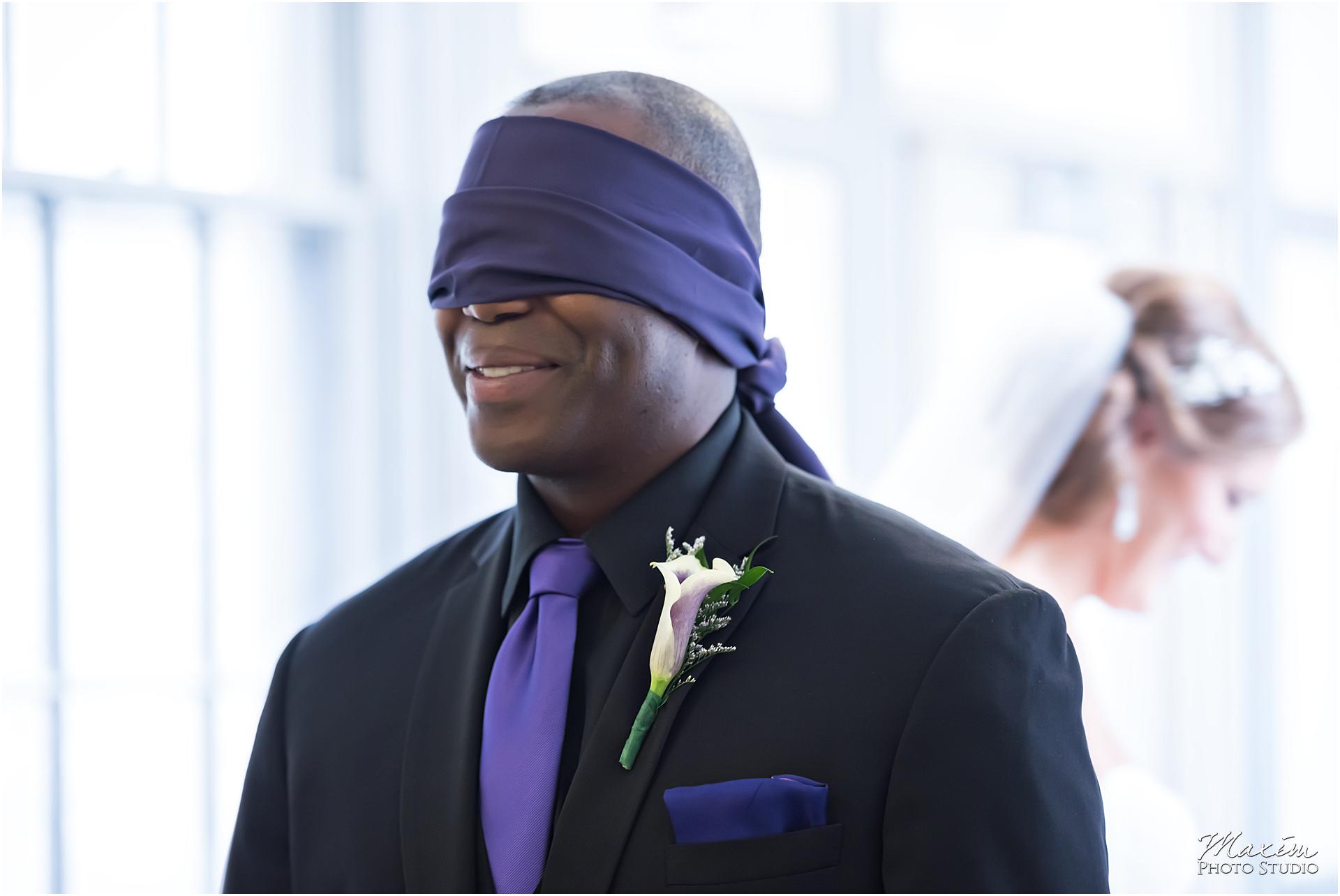 St. Aloysius Chapel Cincinnati Wedding groom blindfold
