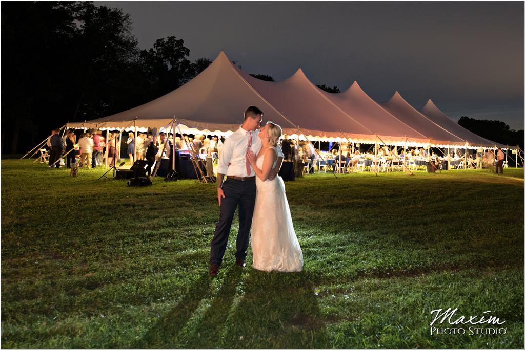Ohio horse farm wedding tent reception bride groom night portrait