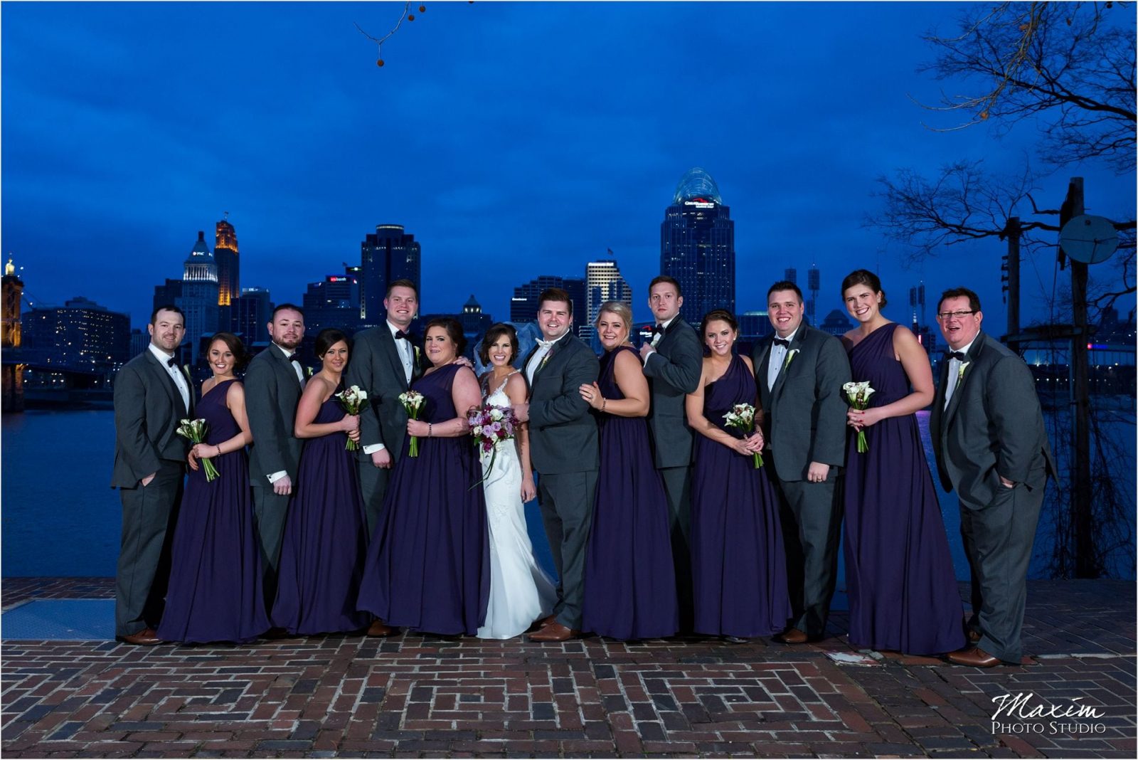 Cincinnati skyline wedding portraits bridal party