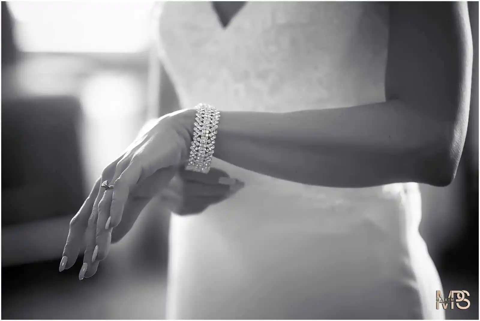 Elegant diamond bracelet on womans wrist in black and white Marriott Rivercenter Covington KY
