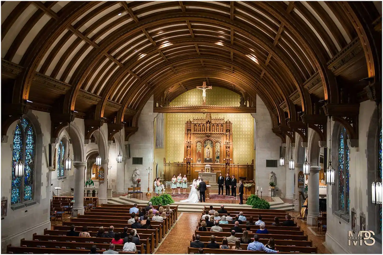 Elegant wedding ceremony in a historic church interior.