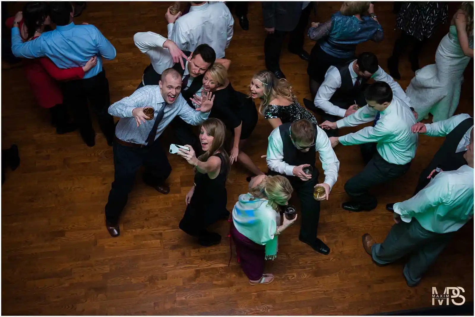 Energetic wedding reception with guests enjoying dance floor festivities The Grand Covington KY
