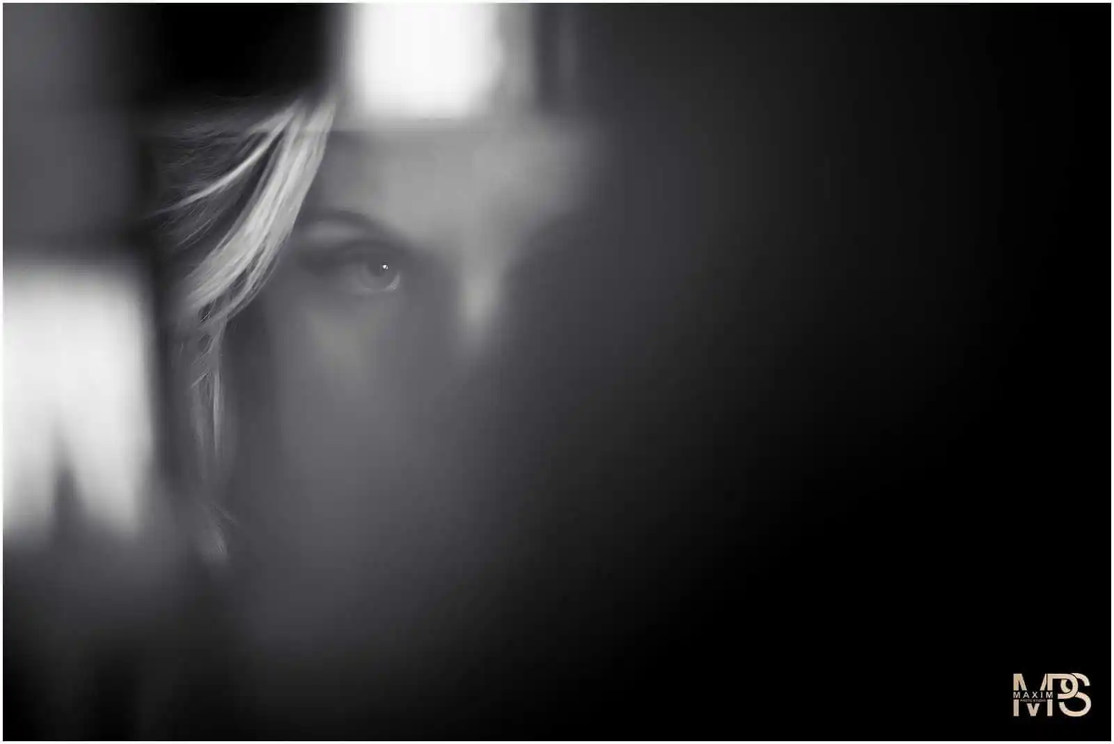 Intense female gaze in artistic black and white shadow photography Marriott Rivercenter Covington KY