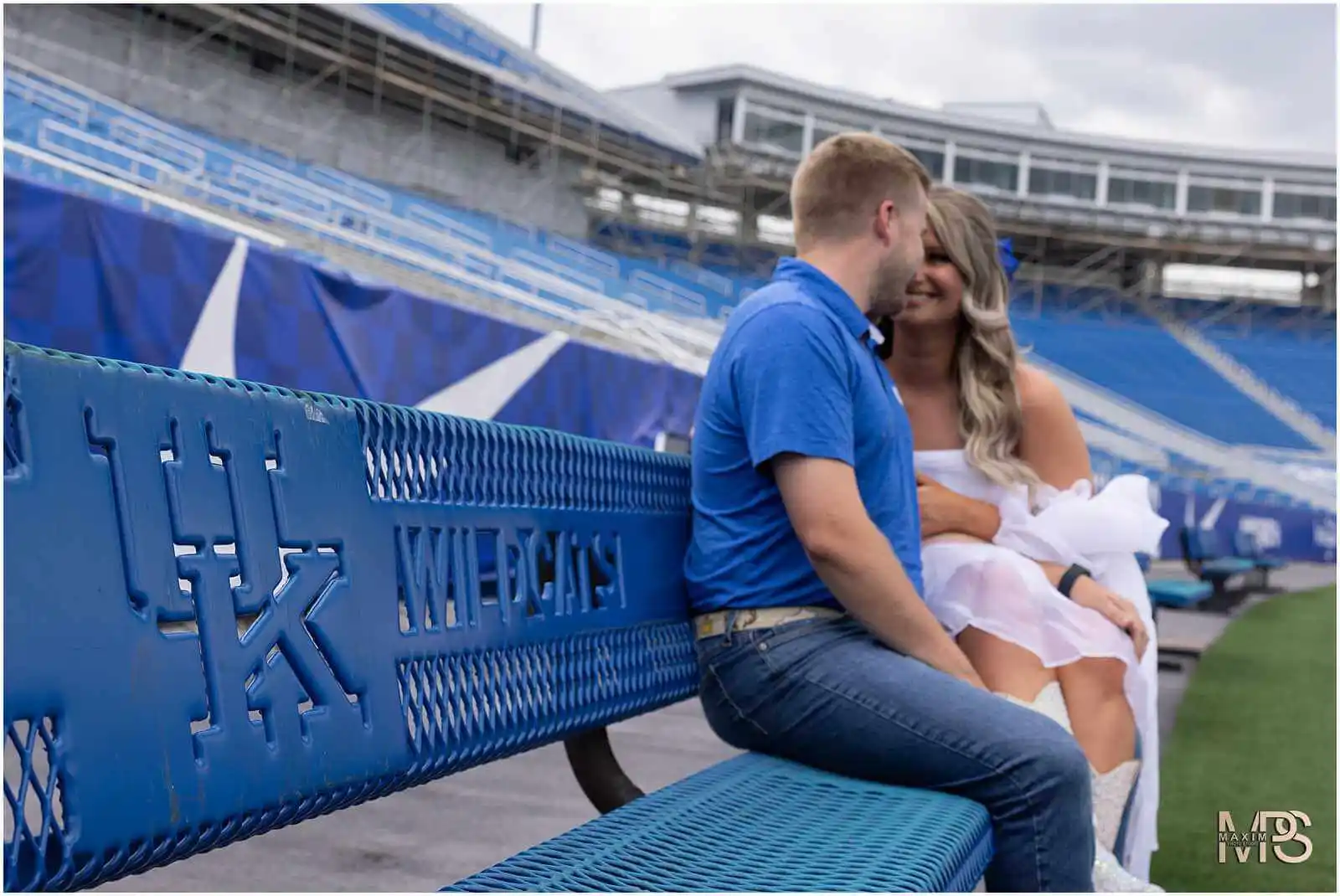 UK Kroger Field bride groom on field engagement session