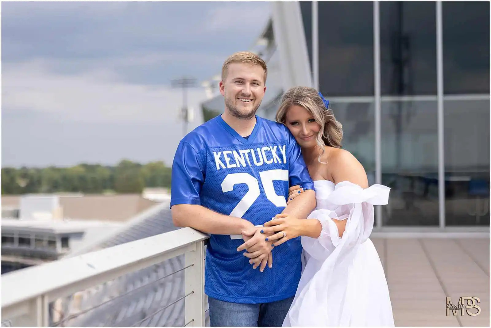 Bride and Groom posing at UK Kroger Field engagement photography session