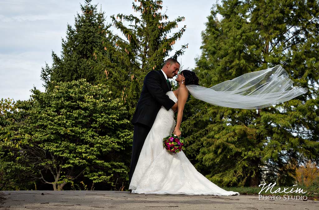 Bride Groom veil blowing in wind Glenwood Gardens