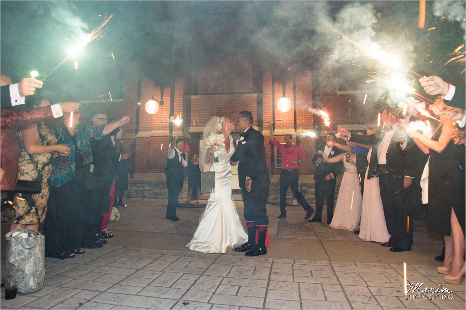 Cincinnati Wedding Photographers Music Hall Wedding Reception Sparkler exit