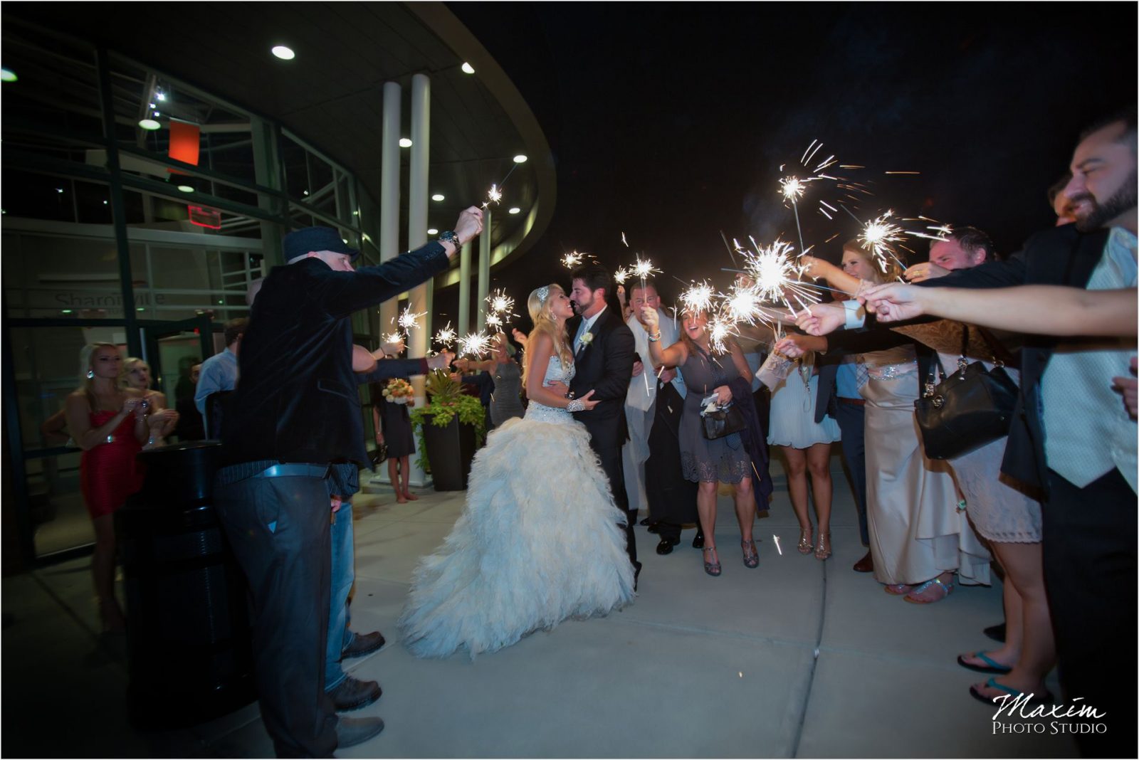 Cincinnati Wedding Photographers Sharonville Convention Center Wedding Reception sparkler exit