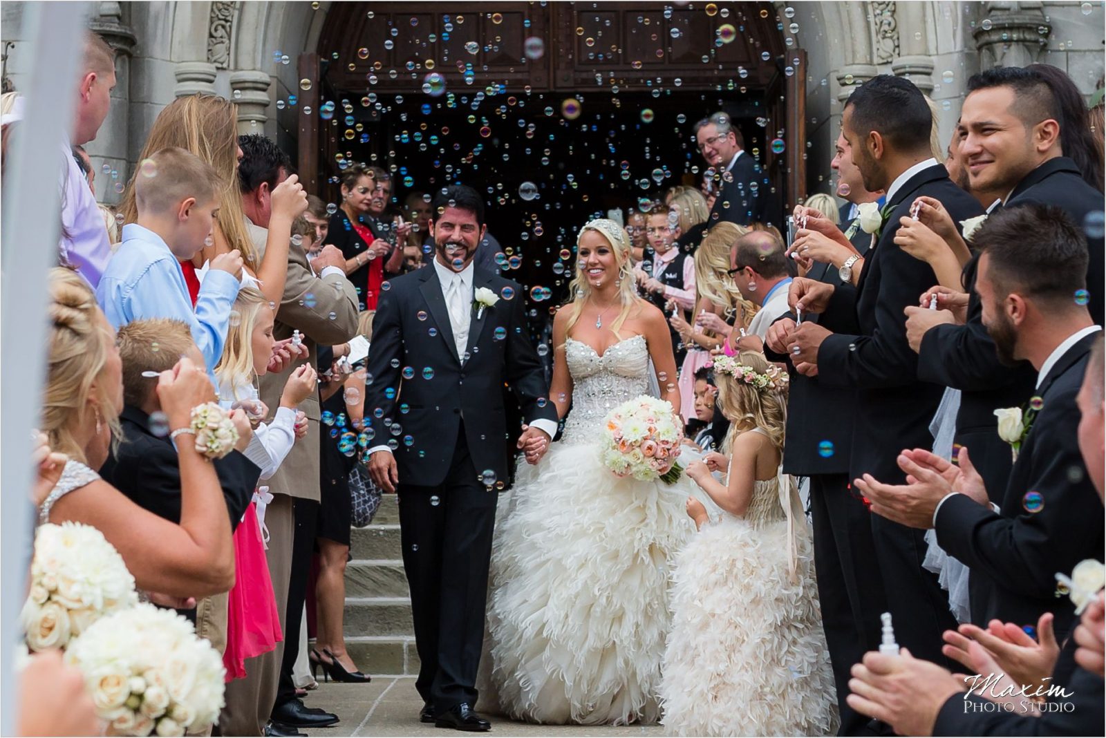 Cincinnati Wedding Photographers Hyde Park United Methodist Church Wedding bride groom bubbles