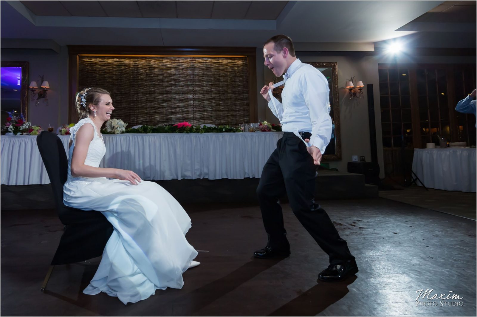 Madison Event Center Covington Kentucky Wedding Reception garter toss