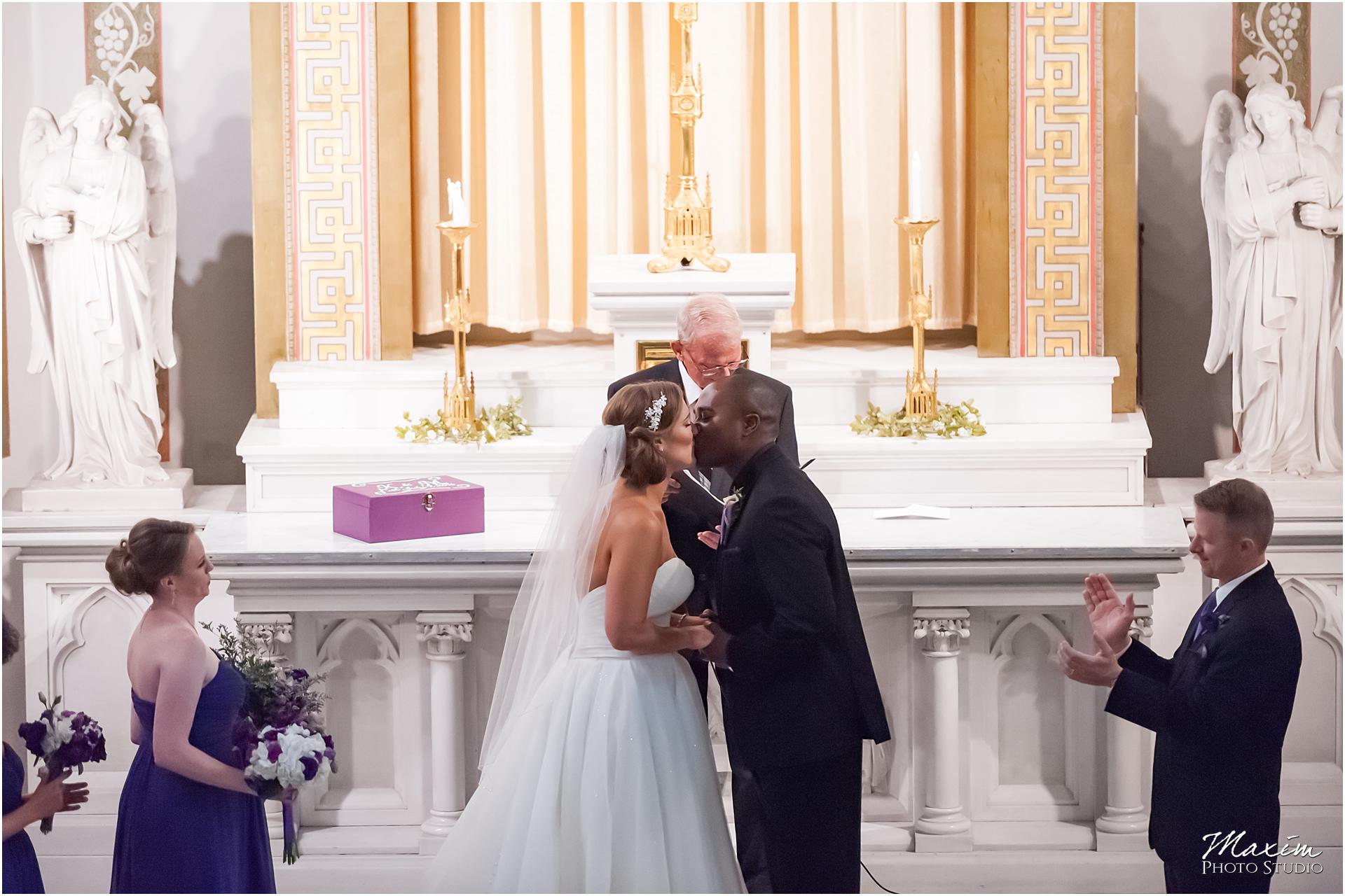 St. Aloysius Chapel Cincinnati Wedding ceremony first kiss