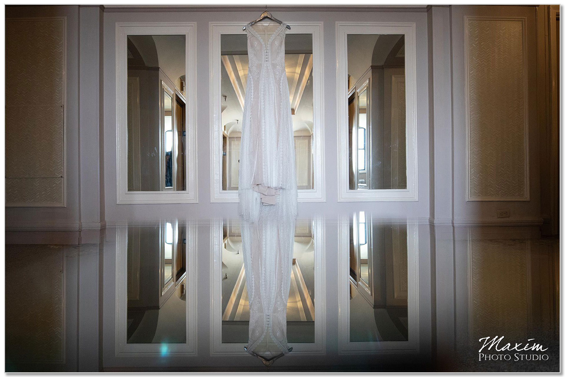 Wedding dress Hilton Netherland Plaza Hotel reflection