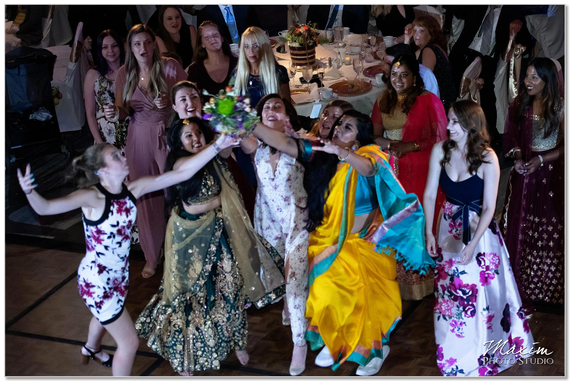 Hilton Netherland Plaza Hindu Wedding Reception Bouquet Toss