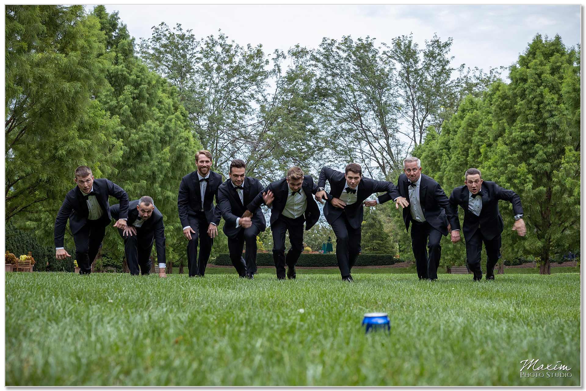 Groomsmen running for beer