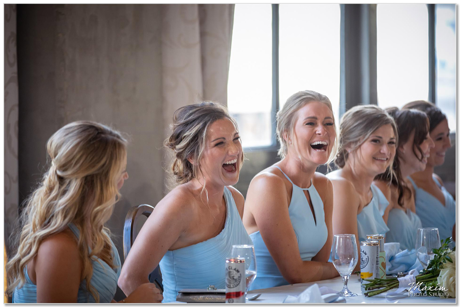 Bridesmaids laughing at The Steam Plant wedding reception