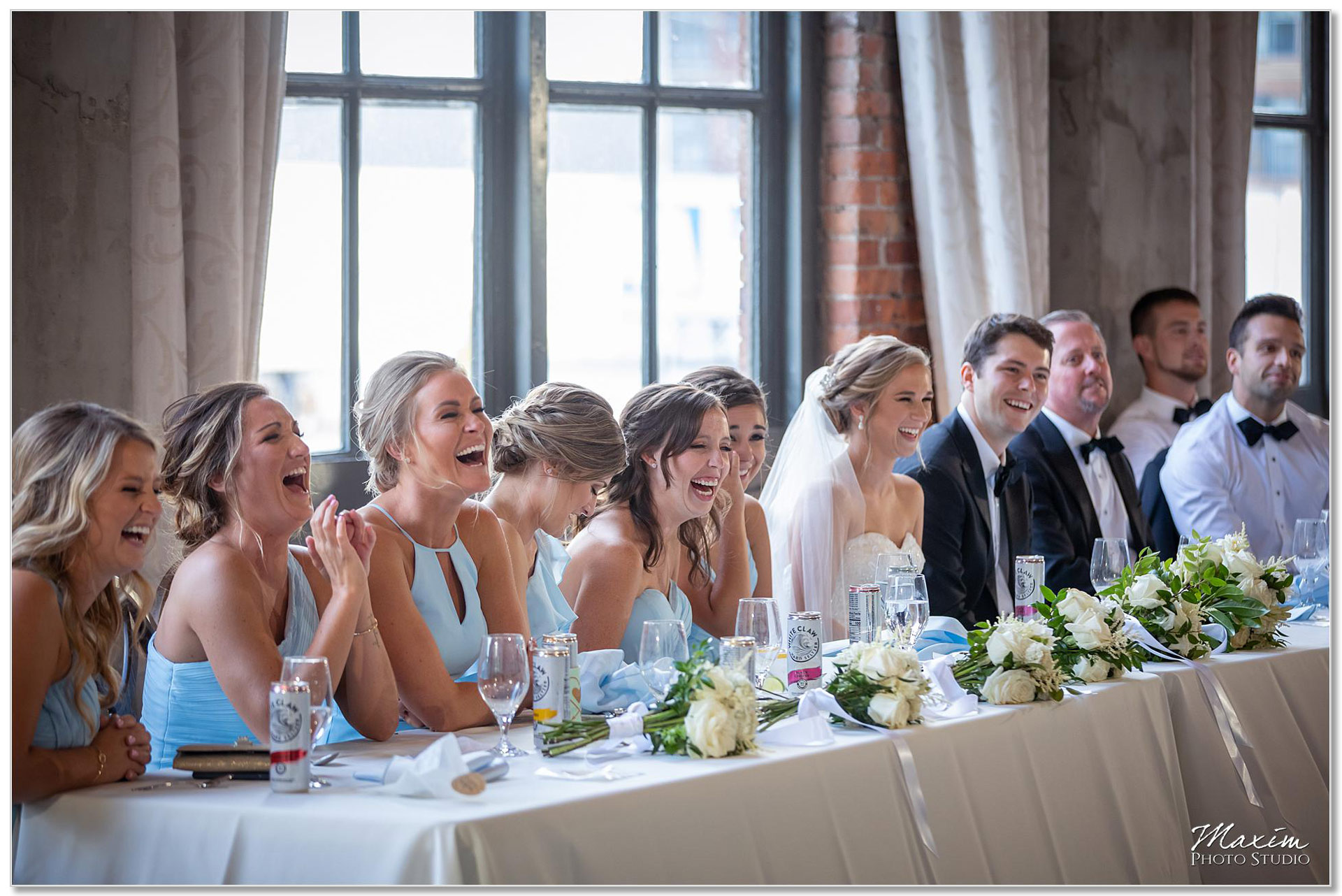 Bridesmaids laughing at The Steam Plant wedding reception