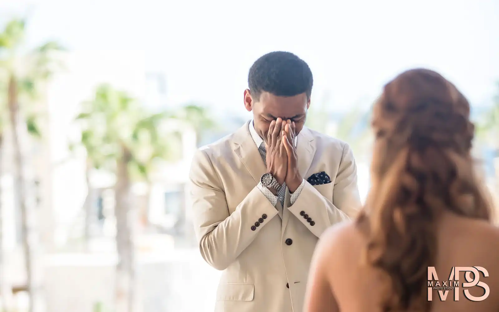 First Look groom crying